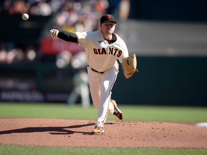 Oct 3, 2021; San Francisco, California, USA; San Francisco Giants starting pitcher Logan Webb (62) delivers a pitch against the San Diego Padres during the first inning at Oracle Park.
